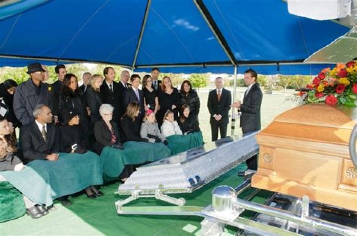 Does a minister conduct a funeral?