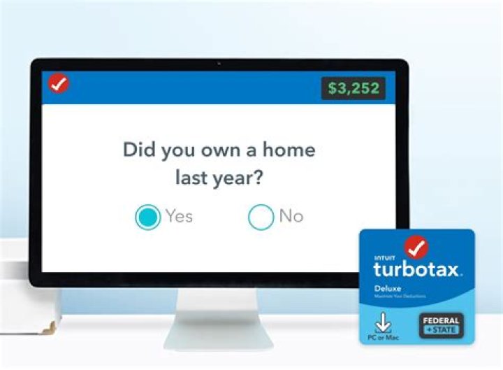 How do I load a CD into TurboTax?